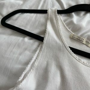 Cropped white laced-lined top